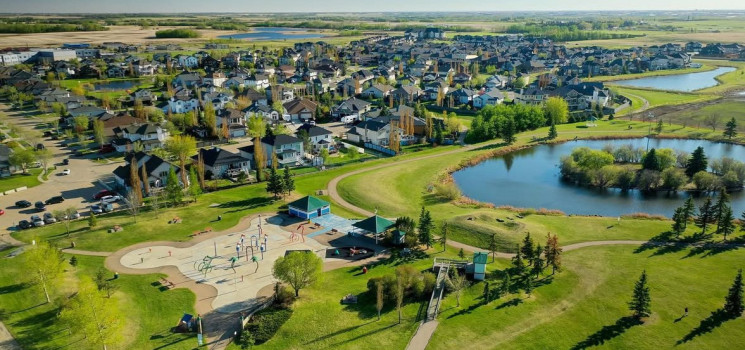 Aerial view of Triomphe in beaumont - Vibrant family-friendly community with green space, parks, and new custom homes by Vita Homes