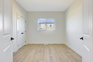 Spacious den in the Aria model by Vita Homes, Custom home builder offering new homes in Edmonton and Beaumont