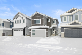 Contemporary Bellagio model home by Vita Homes, showcasing modern exterior design and double garage - available in Edmonton and Beaumont