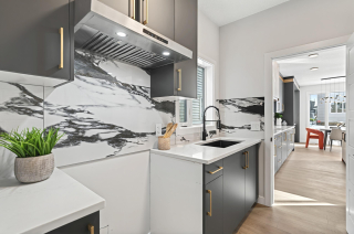 dedicated spice kitchen equipped with modern appliances in the Bellagio with Bar floor plan