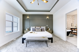 Master bedroom in the mirage model, featuring a custom feature wall