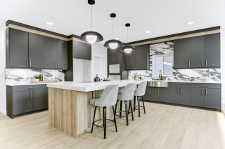 Modern kitchen with stainless steel appliances and quartz countertops in Edmonton and Beaumont