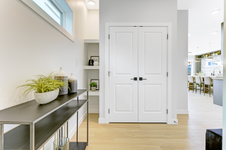 Elegant front foyer with natural lighting in Venetian model