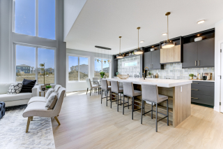 Kitchen in the Venetian model with lots of large windows for natural light. In beaumont and Edmonton