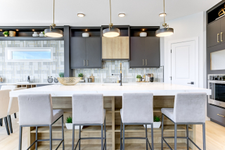 Large island and pendant lighting in Venetian kitchen
