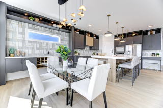 Dining room with stylish lighting in Venetian home