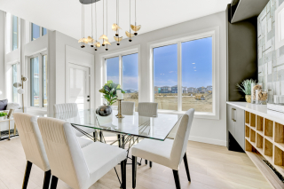 Dining space with natural light in Venetian home