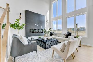 Living area with high ceilings and fireplace in Venetian