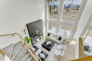 Ariel view of the living room with large windows in the Venetian home.