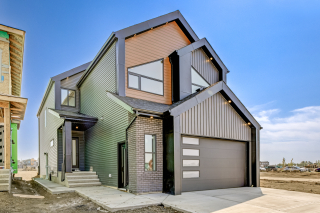 Venetian model exterior with attached garage in Beaumont
