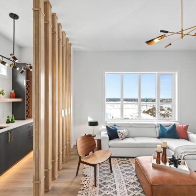 Modern bathroom design with high-end fixtures in the Bellagio with bar home by Vita Homes