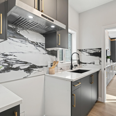 dedicated spice kitchen equipped with modern appliances in the Bellagio with Bar floor plan